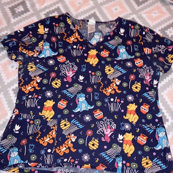 Winnie the Pooh scrub top with flowers and honey pots. Super cute dk blue. - Picture 1 of 1